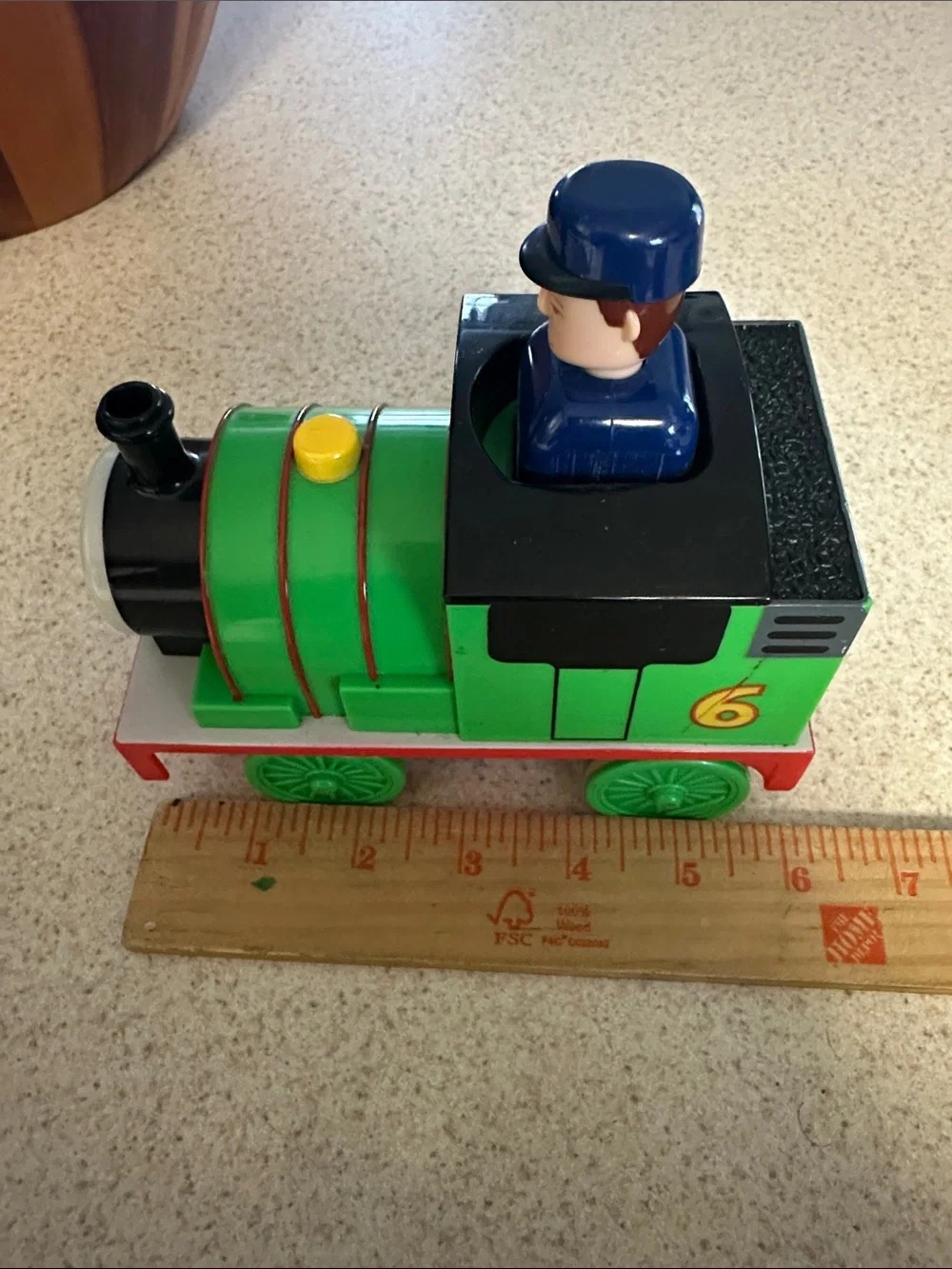 Green Percy the Small Engine toys and cargo cars from Thomas & Friends.